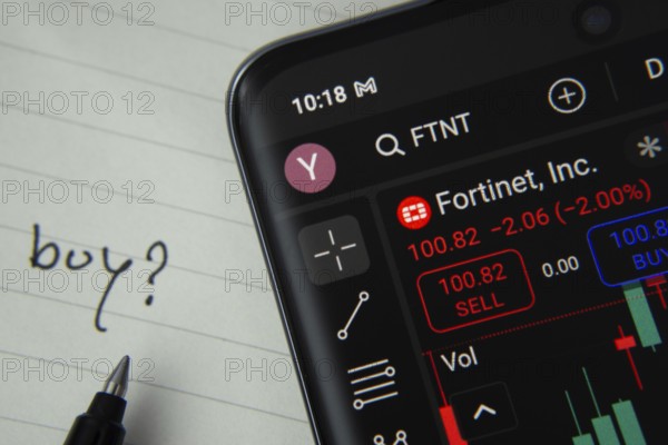 Dhaka, Bangladesh- 20 June 2025: Fortinet Inc stock trading details displayed on smartphone with