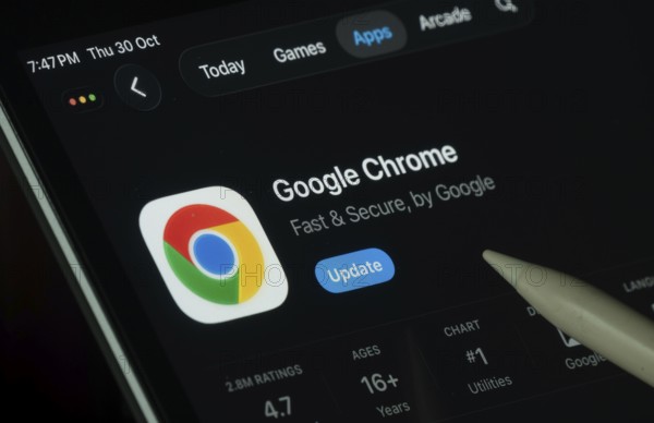 Dhaka, Bangladesh- 30 Oct 2025: Google Chrome app displayed on a iPad screen in dark mode with a