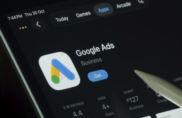 Dhaka, Bangladesh- 30 Oct 2025: Google Ads app displayed on a iPad screen in dark mode with a