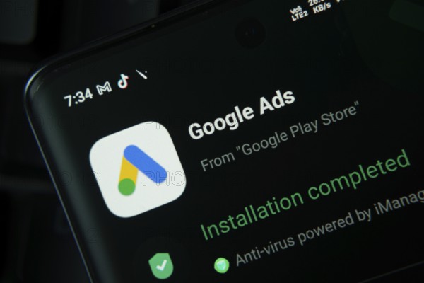 Dhaka, Bangladesh- 27 July 2025: Smartphone screen displaying Google Ads installation confirmation