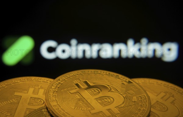 Dhaka, Bangladesh- 19 Sep 2025: Close-up of Bitcoin coins with the Coinranking logo visible on a