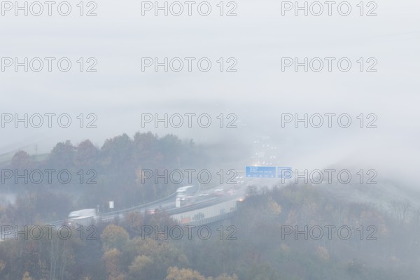Aichelberg Alb climb of the A8 in thick fog on an autumn morning. Lkr. Göppingen,