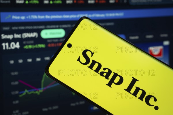Dhaka, Bangladesh- 18 March 2025: Snap Inc logo is displayed on a smartphone screen, with a stock