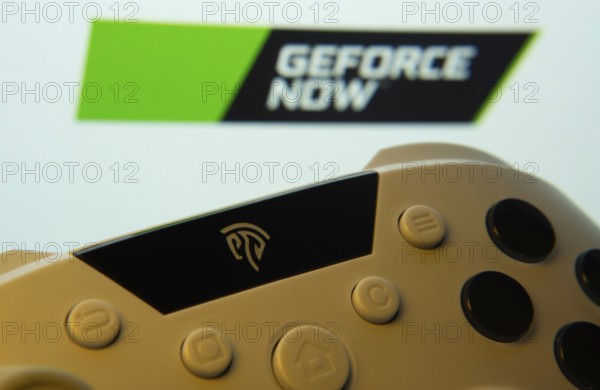 Dhaka, Bangladesh- 14 Nov 2025: A close-up of a gamepad with the Geforce Now seen on screen in the