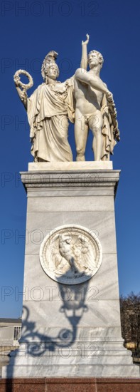 The shadow of a street lamp on the pedestals of the group of figures on the Schlossbrücke, Unter