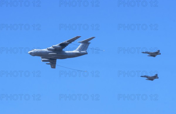 Indian Air Force aerobatic team performs during rehearsals ahead of the air show organised as part