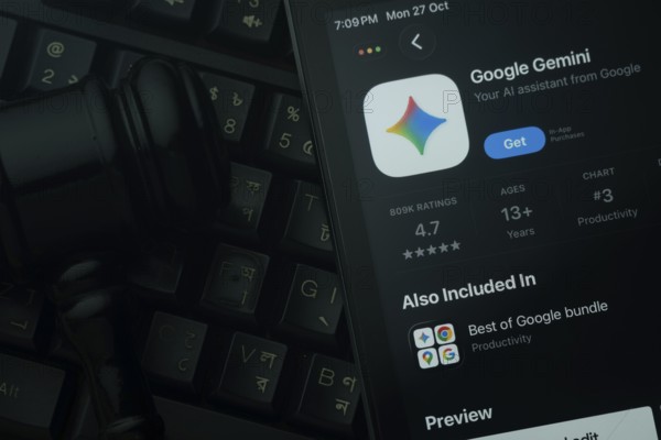 Dhaka, Bangladesh- 28 Oct 2025: An iPad displaying the Google Gemini app against a judge's gavel