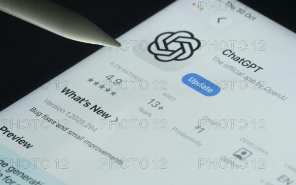 Dhaka, Bangladesh- 30 Oct 2025: ChatGPT app on a iPad screen with a pen pointing at the install