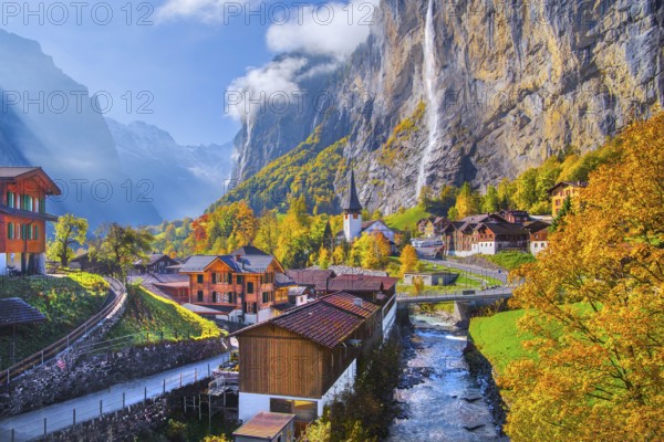 View of town and valley with Staubbach waterfall in autumn, Lauterbrunnen, Bernese Oberland, Canton