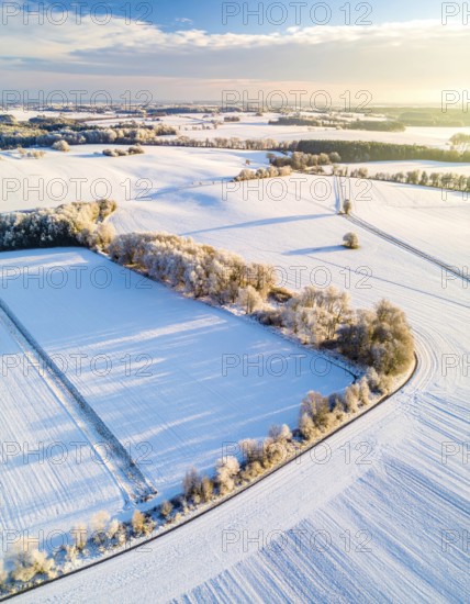Bird Eye Perspective of Frost Covered Farmland. Seasonal Agricultural Scenery, winter and autumn