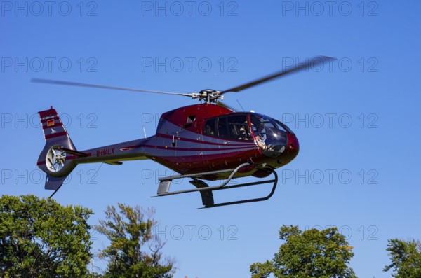 A Eurocopter EC 120B Colibri helicopter, D-HALX registration, during a flight demonstration as part