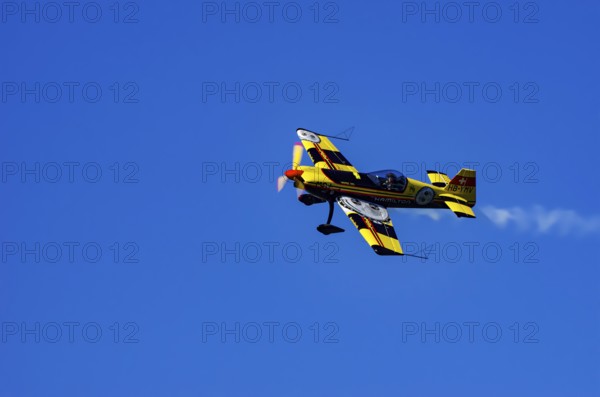 A Votec 351 sport aircraft from the Swiss MSW Aviation AG with registration HB-YMV during a flight
