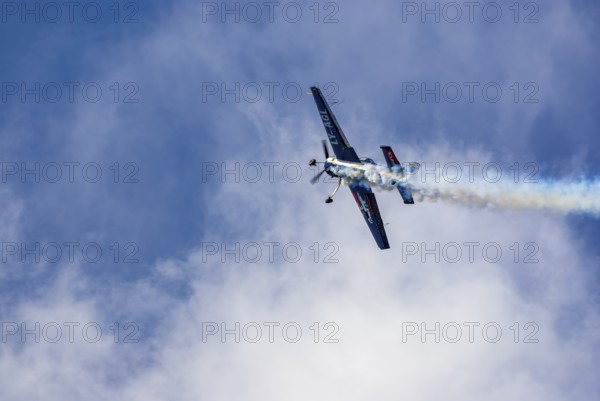A Jakovlev Jak-55 with the registration LY-AGL during a flight demonstration as part of an air show