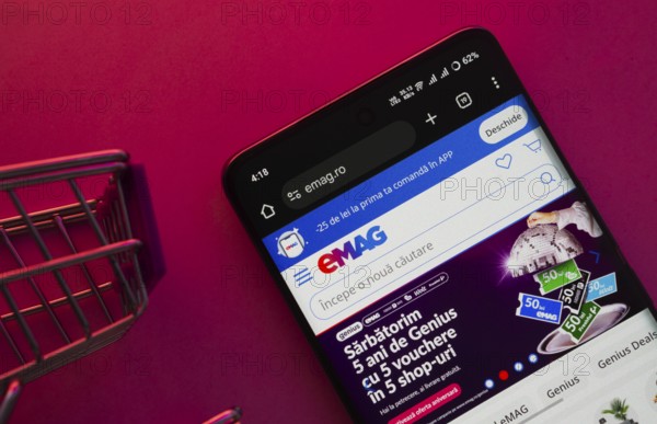 Dhaka, Bangladesh- 03 Oct 2025: A smartphone displaying the Emag website with a shopping cart is