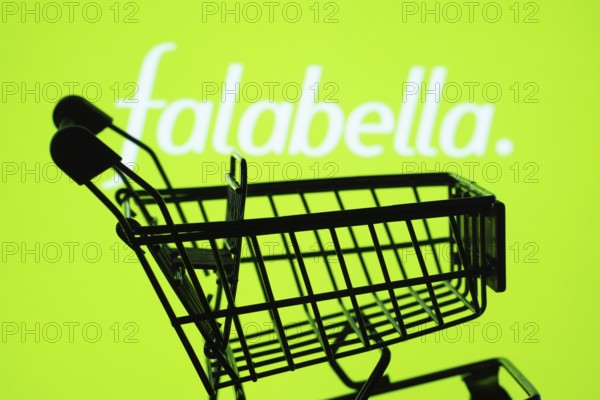 Dhaka, Bangladesh- 03 Oct 2025: Silhouette of a shopping cart in front of the Falabella. logo,