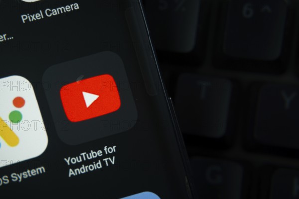 Dhaka, Bangladesh- 27 July 2025: Close-up of smartphone screen showing the youtube for android tv