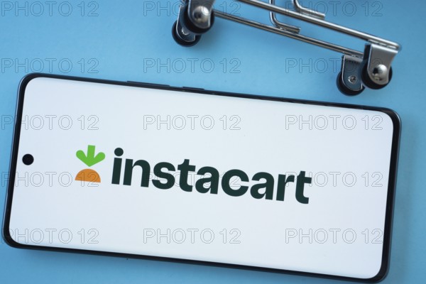 Dhaka, Bangladesh- 03 July 2025: Smartphone screen showing the Instacart logo with shopping cart