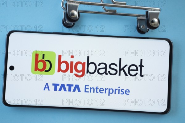 Dhaka, Bangladesh- 03 July 2025: Smartphone screen showing the BigBasket logo with shopping cart