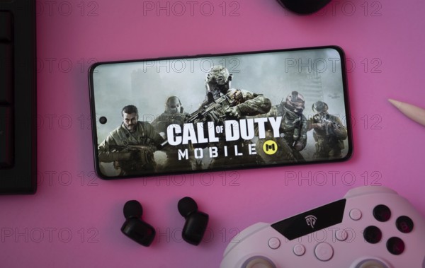 Dhaka, Bangladesh- 06 Sep 2025: A close-up of a gamepad with the Call of Duty Mobile seen on