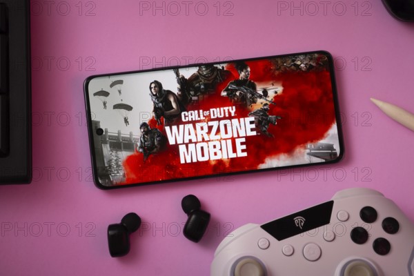 Dhaka, Bangladesh- 06 Sep 2025: A close-up of a gamepad with the Call of duty warzone mobile seen