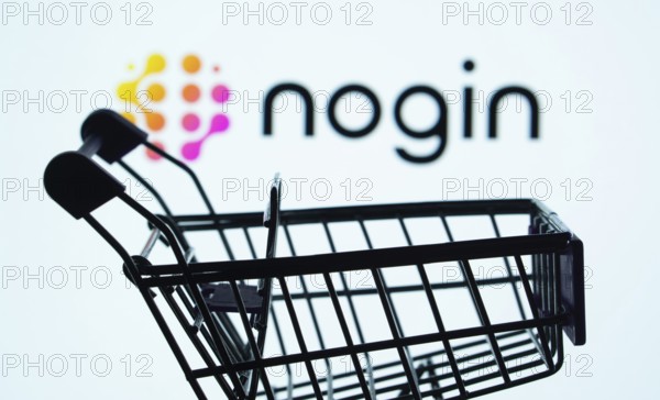Dhaka, Bangladesh- 03 July 2025: Silhouette of a shopping cart in front of the nogin logo,