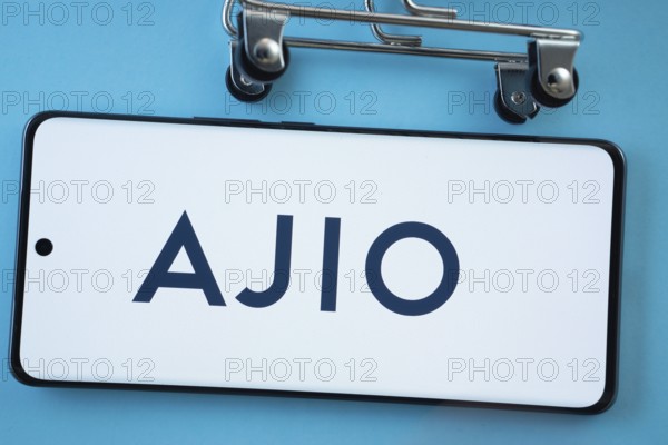 Dhaka, Bangladesh- 03 July 2025: Smartphone screen showing the AJIO logo with shopping cart wheels