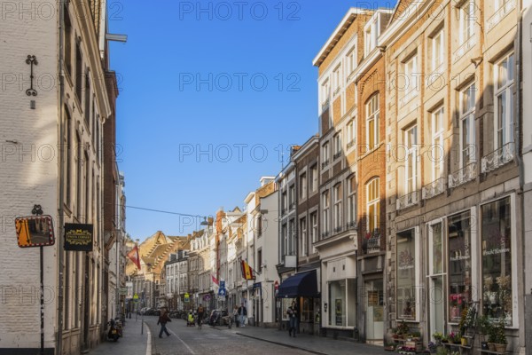 Alley with cafes and shops in the old town of Maastricht, the Netherlands