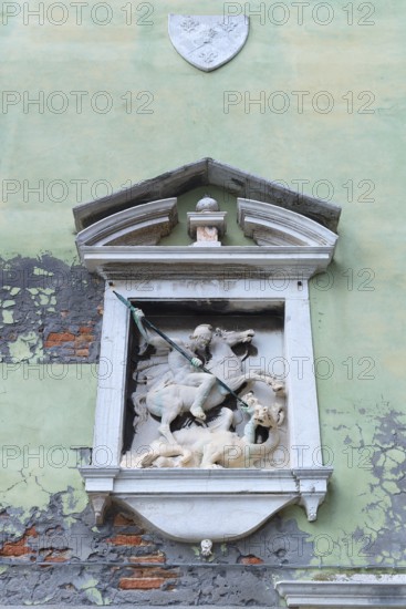 Sculpture of Saint George with the dragon on a house wall, Venice, Veneto, Italy