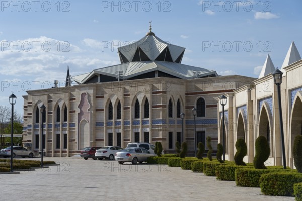 Building with traditional architecture and distinctive domed roof, Irfan Medeniyeti Arastirma ve