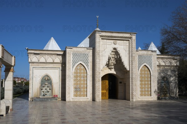 Traditional building with Islamic architectural elements and blue decorations, Istiklal Harbi