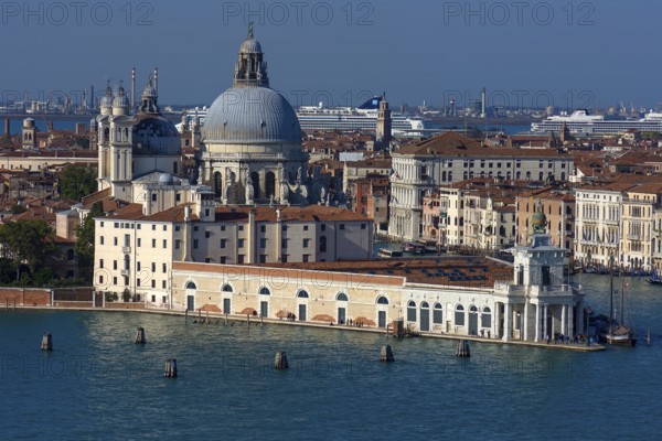 Santa Maria della Salute church, Museum of Modern Art in front, cruise ships anchored at the back,
