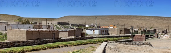 Overview of a small village in a dry and sunny hilly area, San Antonio de los Cobres, Salta
