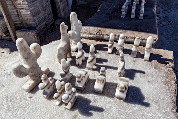 Salt chess pieces on a board in a detailed, bright desert setting, salt sculptures in the Salar de