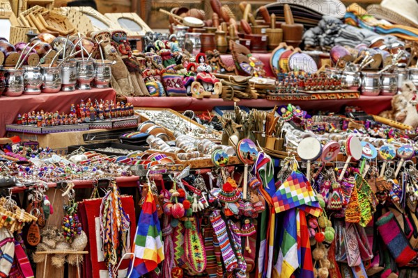 Colourful traditional crafts and souvenirs on a market stand, tourist and souvenir market of Santa
