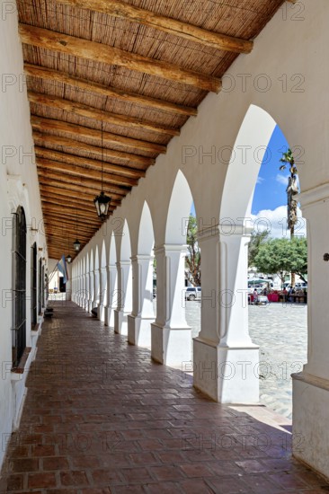 Colonial arcade series with wooden roof, opens to a public square, The arcades of Cachi in