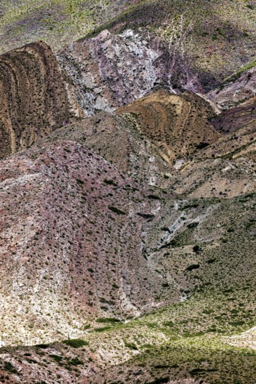 An impressive image of mountains that fascinate with their variety of colors and natural patterns,
