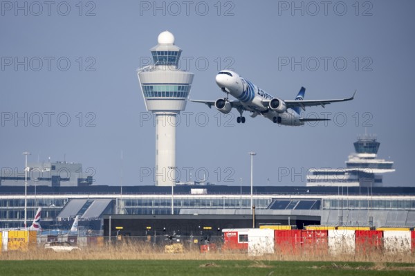 Egyptair Airbus aircraft takes off from Kaagbaan runway, 06/24, at Amsterdam Schiphol Airport, AMS,