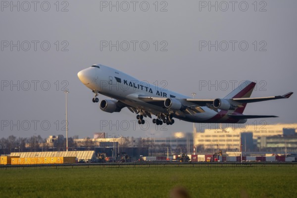 US cargo plane, Kalitta Air Boeing 747-400, aircraft taking off from Kaagbaan runway, 06/24, at