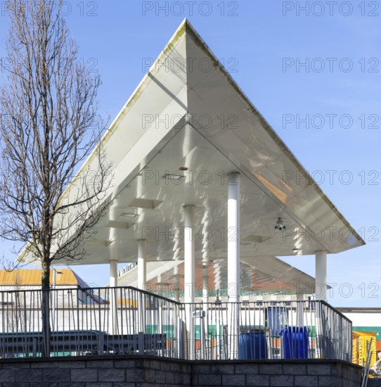 Triangular white canopy and slender columns, Plymouth bus station, Plymouth, Devon, England, UK