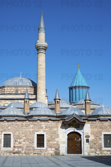 Mosque with minaret and turquoise dome under blue sky, Mevlana Museum, Mevlana, landmark, mausoleum