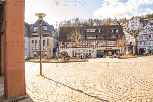 Sunny town square with half-timbered houses and lively atmosphere, Calw, Calw district, Germany