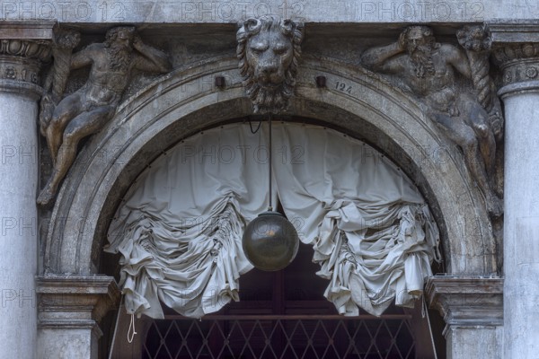 Detail with sculptures from the historic arcade of the authorized signatories, Venice, Veneto,