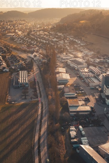 Industrial Landscape at Twilight with Roads and Houses nestled in Hilly Terrain, Aidlingen,