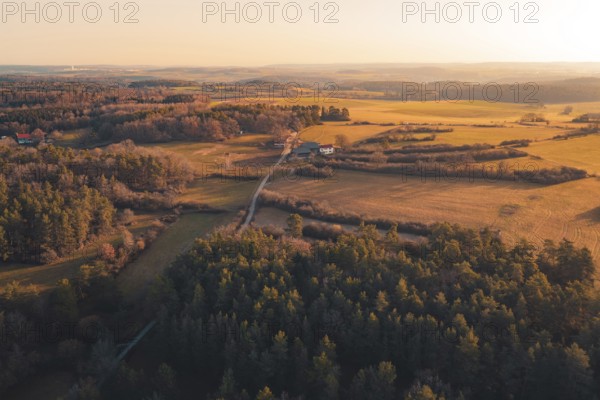 Open landscape with fields and forests at sunset, isolated houses bring seclusion, Gechingen, Calw