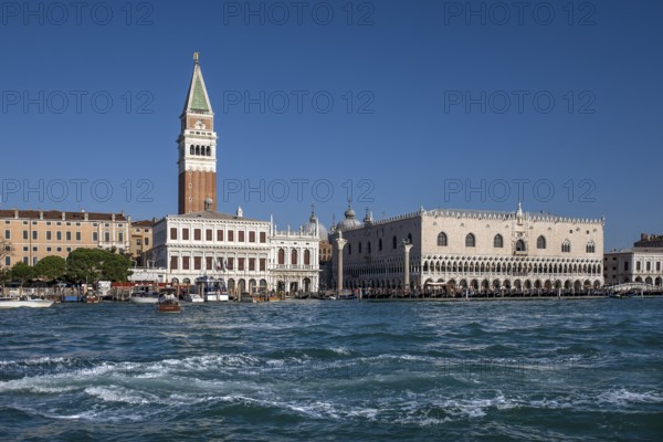View of St. Mark's Campanile and Doge's Palace from the Grand Canal, blue sky, Venice, Veneto,