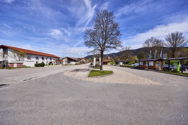 Inzell bus station, general architecture, residential buildings, bare winter trees, blue sky,