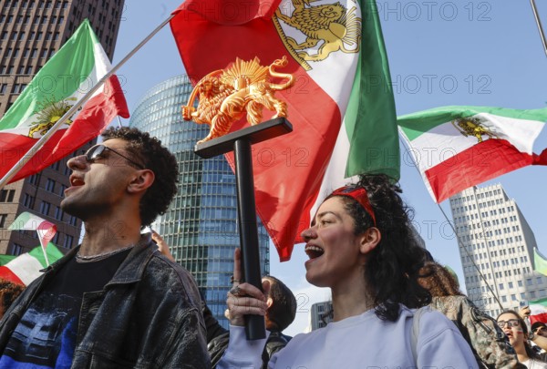 Iranians demonstrate on the day of the US and Israeli attack on Iran in Berlin, 28.02.2026. People