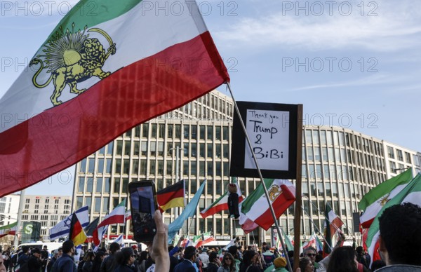Iranians demonstrate on the day of the US and Israeli attack on Iran in Berlin, 28.02.2026. A