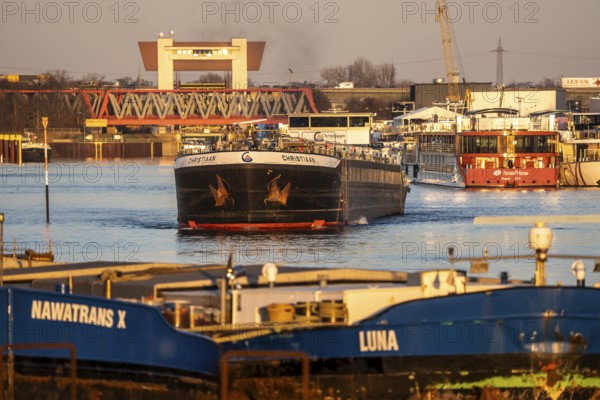 Barges, in the harbor canal in the port of Ruhrpott, have left the Meiderich canal lock, from the
