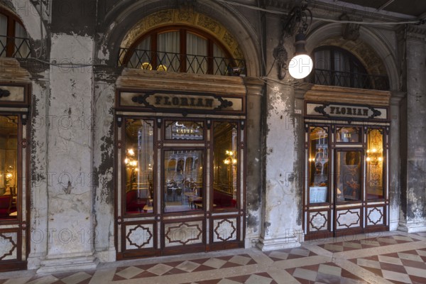 Historic Café Florian in the arcades of the old Procuration, 16th century early in the morning,